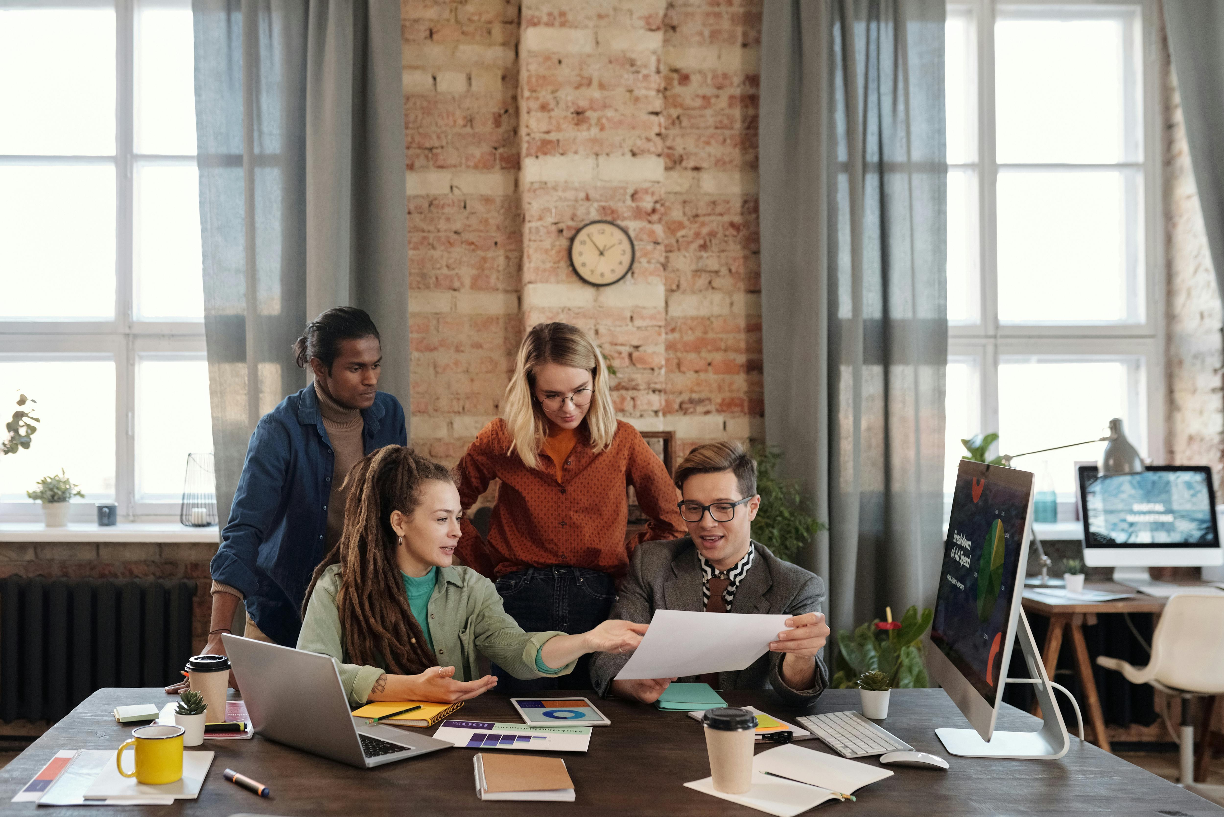 a group of people having a meeting